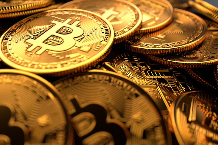 Pile of Bitcoins randomly dropped with bright lighting