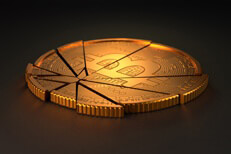 Concept of Bitcoin price drop, market volatility, or cryptocurrency market crash showing broken or cracked Bitcoin