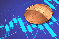 Bitcoin laying on blue stock price candlestick chart