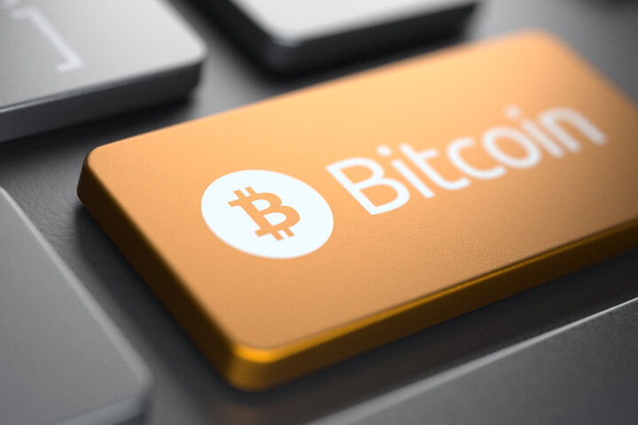 Laptop keyboard with bronze metallic Bitcoin key