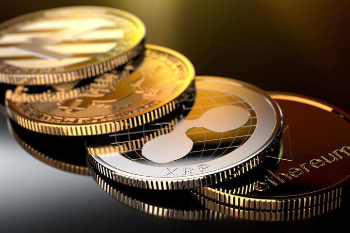 Curved row of crypto coins with gold reflection from window light