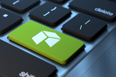 Laptop keyboard with green Neo cryptocurrency key