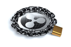 Ripple XRP coin wrapped in heavy chain and locked with brass padlock