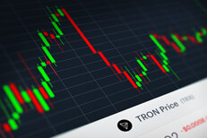 Tron (TRX) stock price candlestick chart monitor screenshot showing volatility and price increases and declines