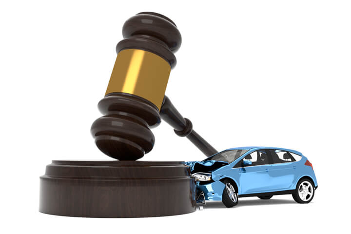 Car crashed into gavel liability insurance concept image