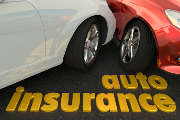 Two car collision showing damage and auto insurance words in foreground