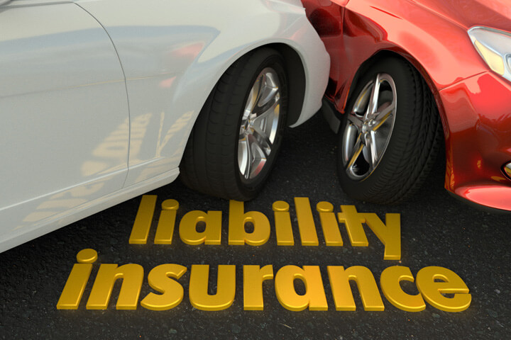 Two car accident showing words liability insurance in foreground