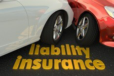 Two car accident showing words liability insurance in foreground
