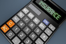 Top view of calculator with LCD reading Insurance