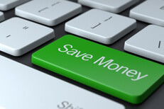 Laptop keyboard with Save Money key for finding cheaper car insurance rates