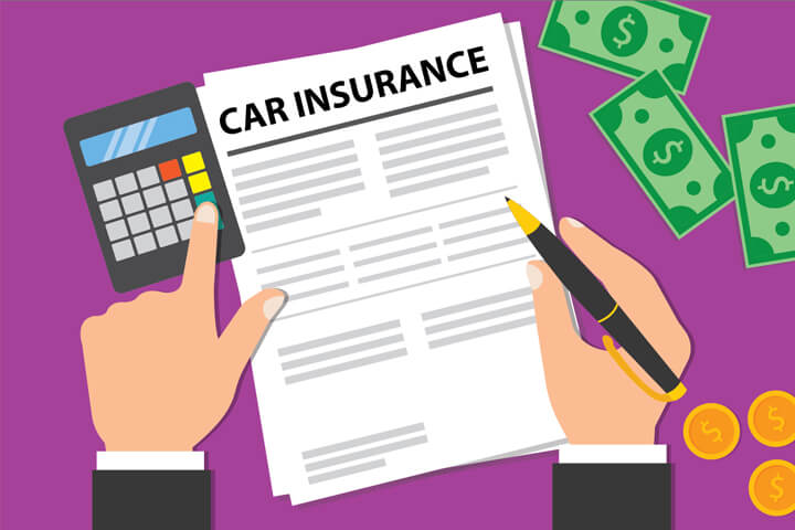 Desk with car insurance policy, money, and calculator with business man hands holding pen and touching key on calculator