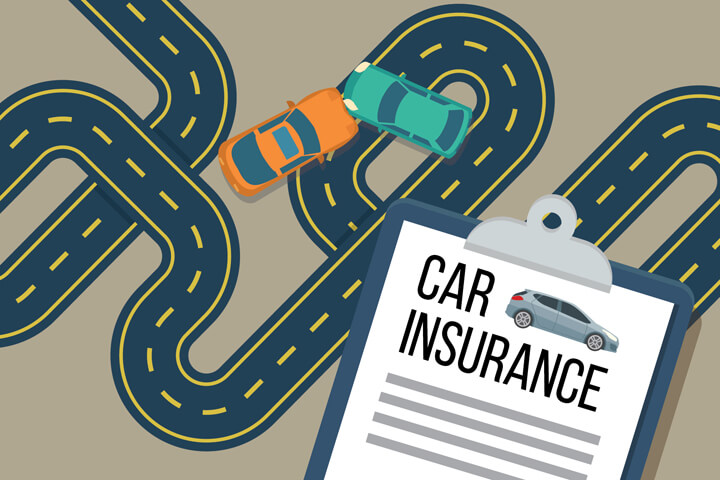 Two small cars crashed on very curvy road with car insurance policy in foreground