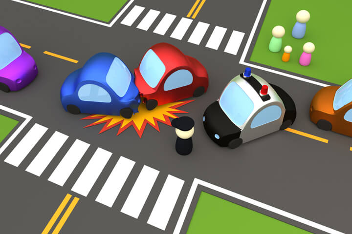 Two vehicle collision on street with police car and policeman