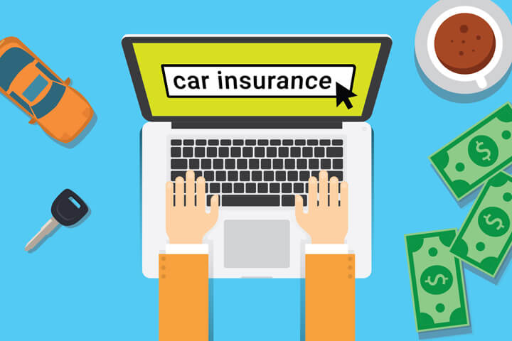 Desktop with laptop, car key, toy car, coffee cup, and money with screen showing online car insurance search