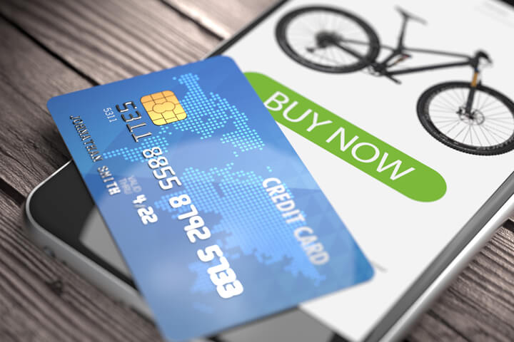 Mobile phone showing buy now button with credit card concept for mobile shopping