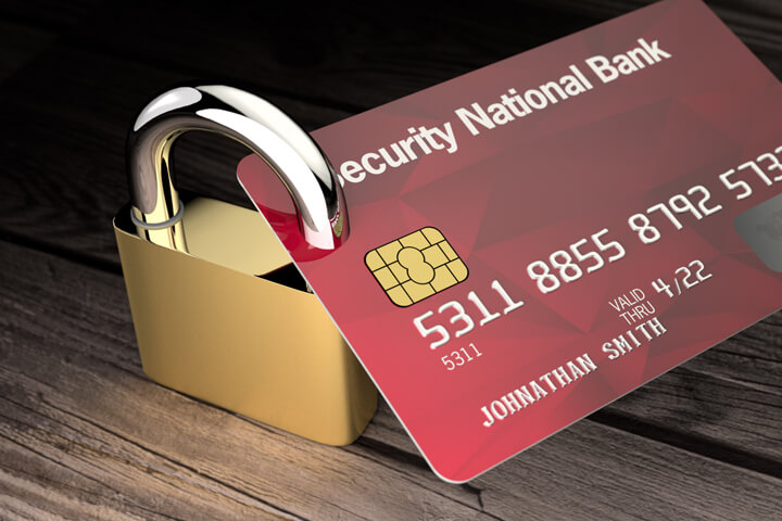 Padlock locked to credit card concept for credit lock