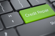 Concept image of credit repair with dark laptop keyboard