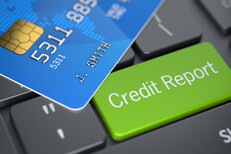 Credit report key with card Computer keyboard with green credit report key and blue credit card concept for online credit reports