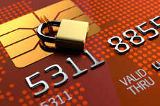 Close up photo of credit card EMV chip locked by padlock