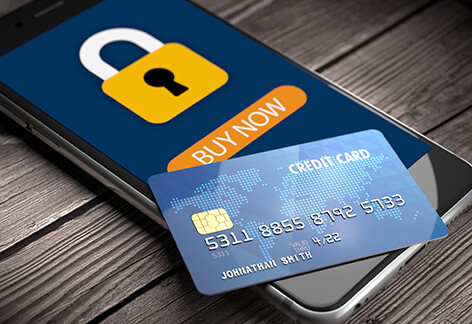 Mobile phone showing secure padlock icon with buy button and credit card