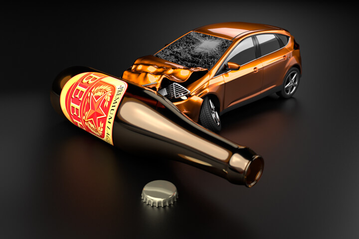 Orange car crashed into beer bottle laying on side concept for drunk driving or DUI with dark background