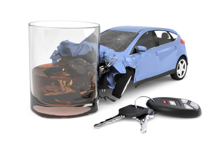 Drunk driving concept of small blue car collision with alcoholic drink isolated on white background with car keys