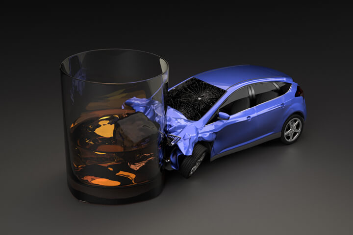 Compact car crashed into glass of whiskey after driving under the influence