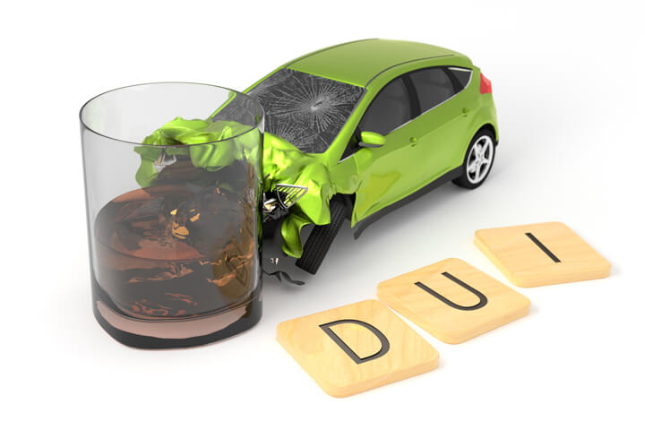 DUI accident with wood letters spelling DUI in foreground