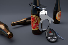 Car keys handcuffed to a beer bottle DUI arrest concept image