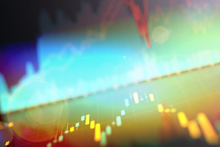Stock area chart and candlestick chart with overlay and lens flare effects
