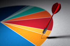 Colorful pie chart with dart targeting one segment