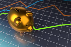 Shiny metallic gold piggy bank on top of glossy line chart with reflection