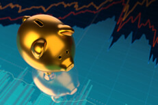 Gold piggy bank on area chart Shiny gold metallic piggy bank on stock price area chart with glossy surface reflection