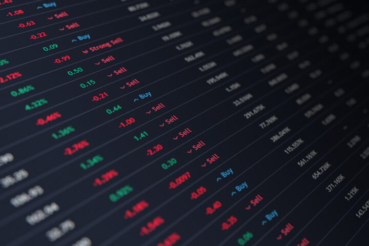 Stock ticker with stock prices, percentage change, buy and sell recommendations, and market capitalization