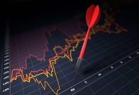 Stock price chart on dark background with red dart randomly stuck into the chart