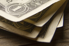 Free money photo of stack of one dollar bills close up of corner