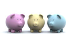 Three pastel colored piggy banks isolated on white background