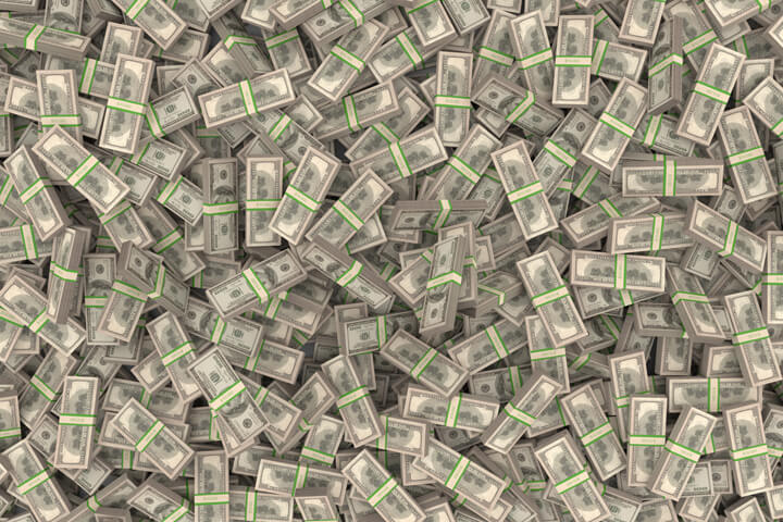 Free image showing millions of dollars in bundled U.S. currency falling from the sky in random pattern