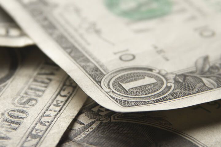 Full frame photo of random pile of dollar bills