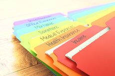 Manila tax folders Colorful manila folders for tax categories like income, expenses, deductions, mortgage, and insurance