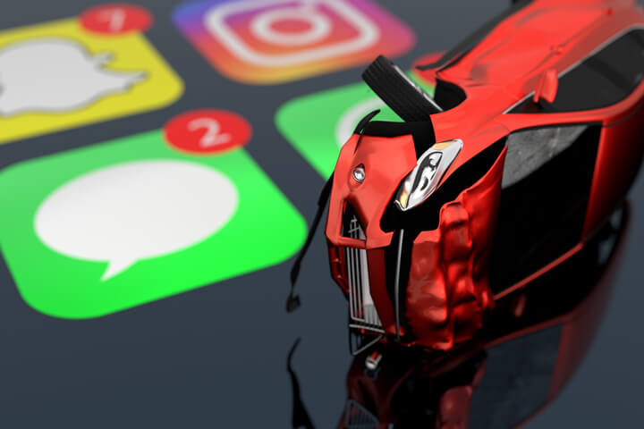 Rollover accident on top of shiny iPhone screen showing text message icon