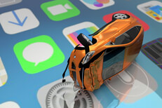 Car accident on top of cell phone screen showing various app icons